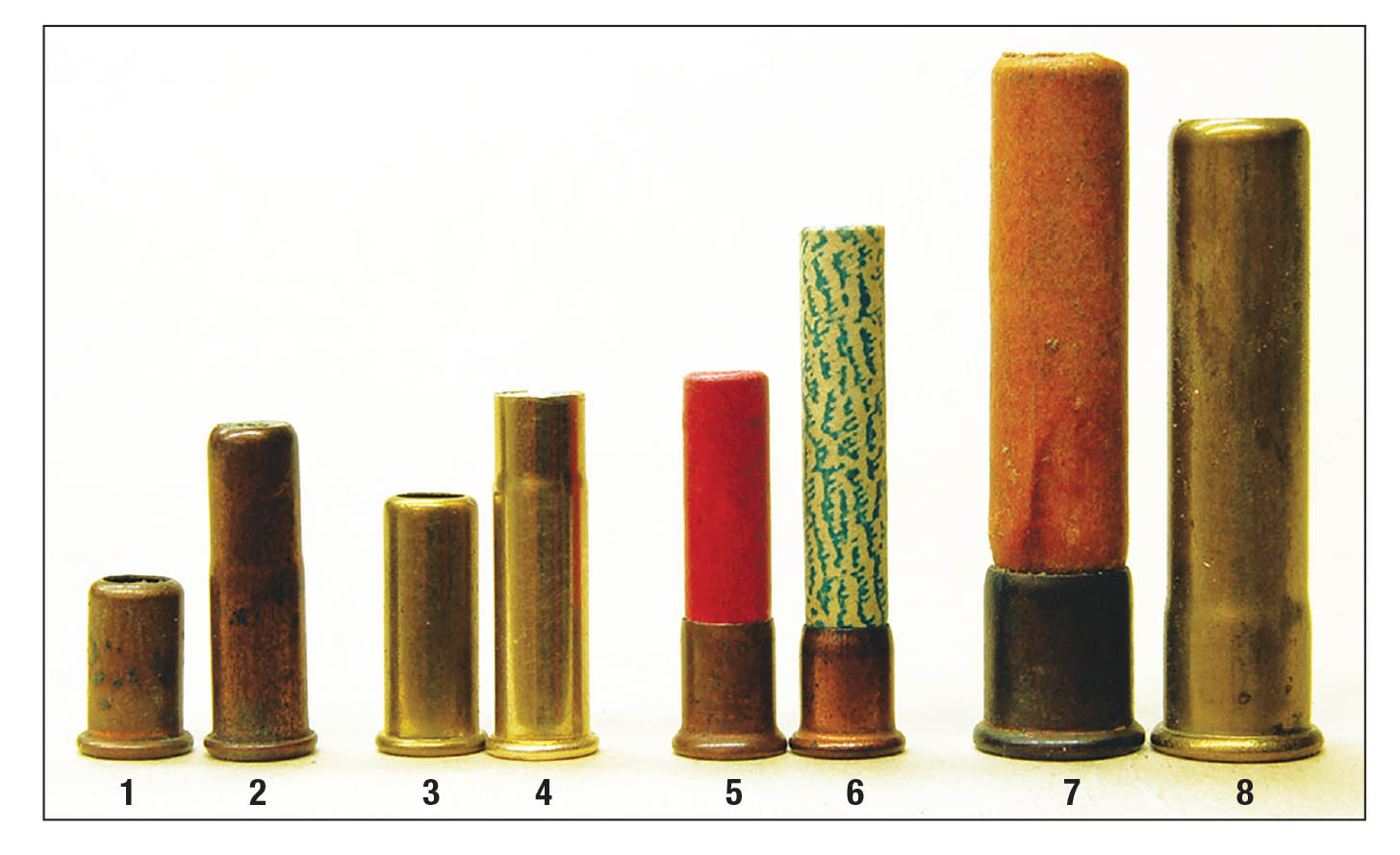 Early rimfire shot rounds include the: (1) .22 Short, (2) .22 Short extended case (note the slight bottleneck at .22 Short chamber mouth), (3 and 4) .22 Long or LR in standard and extended case, (5 and 6) 5mm Short and Long, (7 and 8) 9mm in a paper  and brass case.